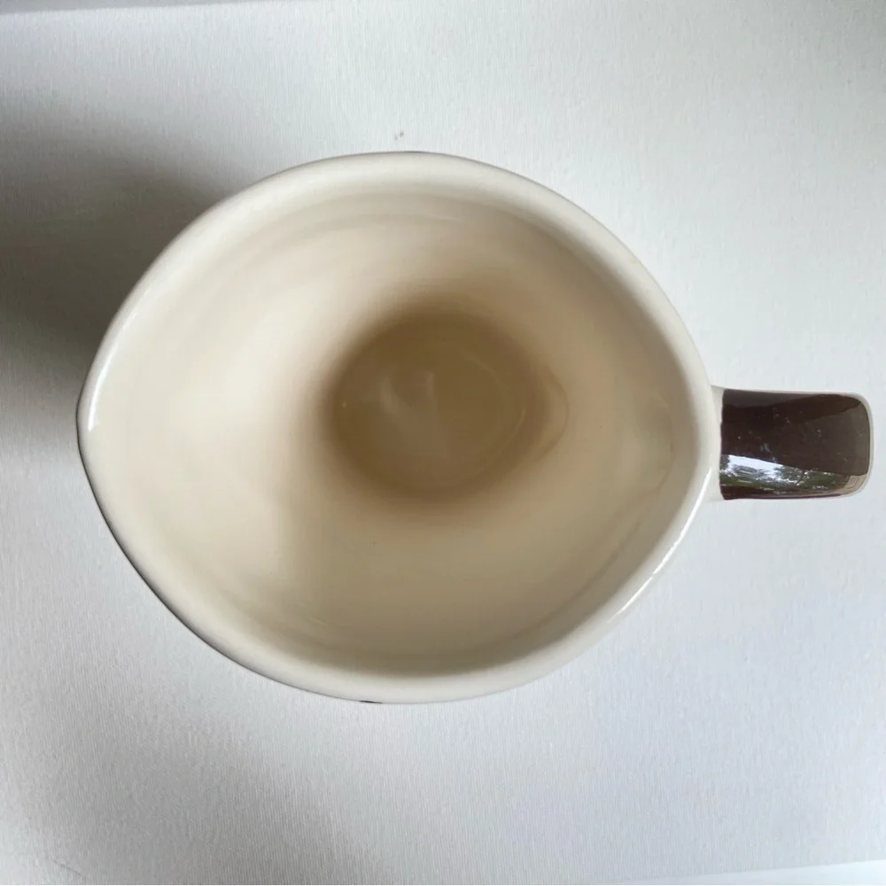 Pier 1 tall asymmetrical oval coffee mug with abstract fall leaves and stripes